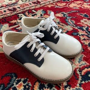 White navy saddles shoes kid size 11